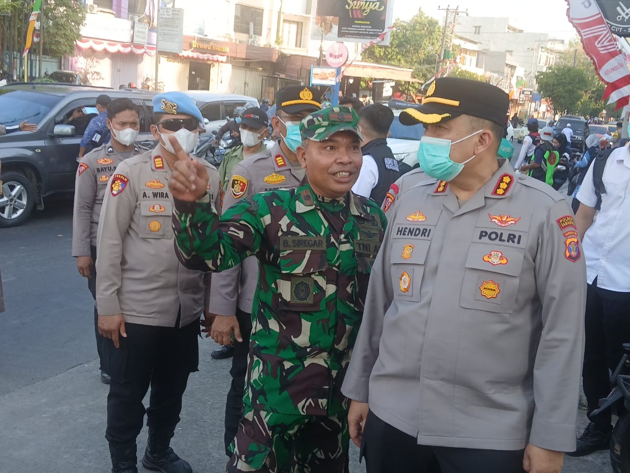 CEGAH DAMPAK KABUT ASAP, DANRAMIL 0901-01/SAMARINDA ULU TURUT HADIR DALAM PEMBAGIAN 10.000 MASKER GR