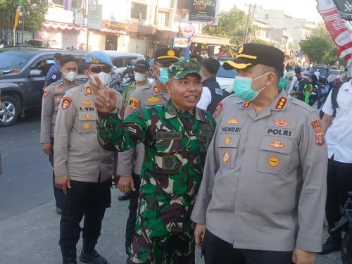 CEGAH DAMPAK KABUT ASAP, DANRAMIL 0901-01/SAMARINDA ULU TURUT HADIR DALAM PEMBAGIAN 10.000 MASKER GR